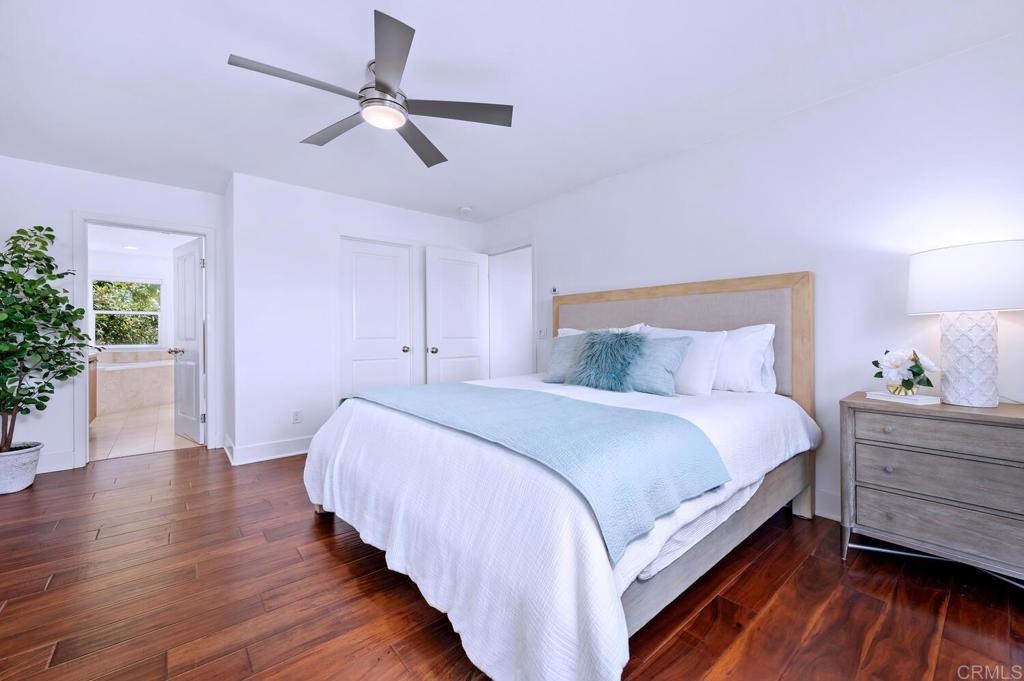 647 Arden Drive Encinitas, CA 92024 - Photo 18 of 36 a bedroom with bed and wooden floor