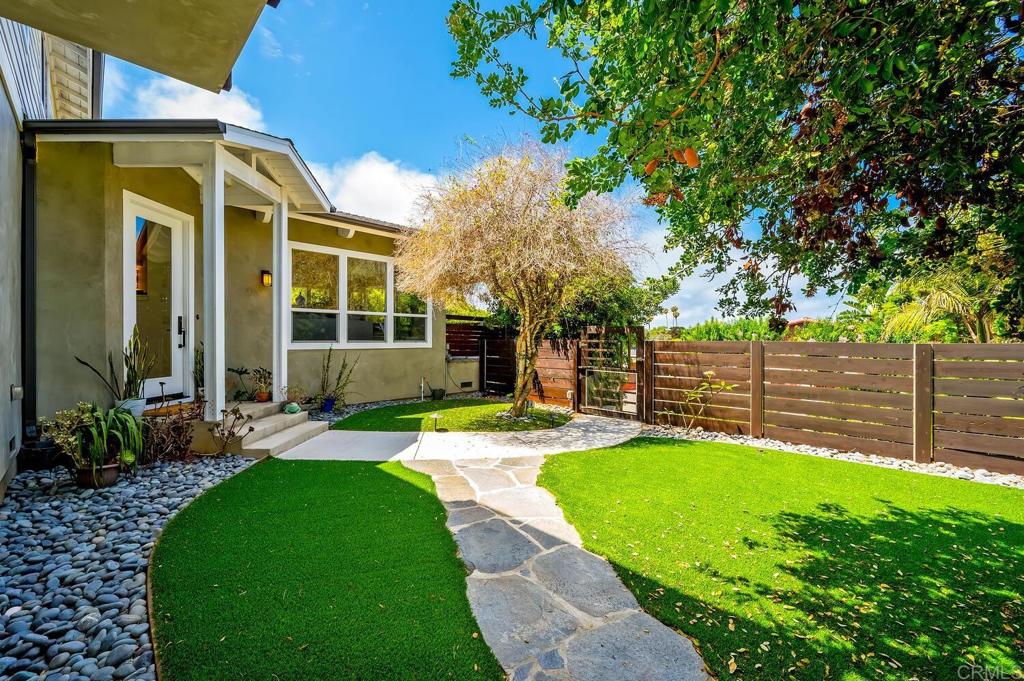 647 Arden Drive Encinitas, CA 92024 - Photo 31 of 36 a view of a house with backyard and sitting area