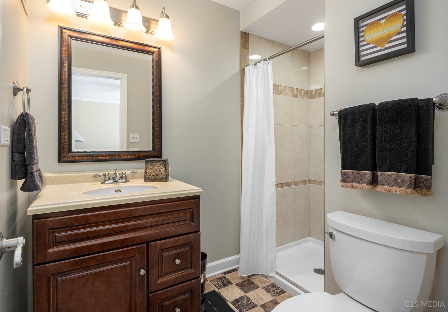 739 Old Barn Road Lake Barrington, IL 60010 - Photo 13 of 37 a bathroom with a sink a toilet and mirror