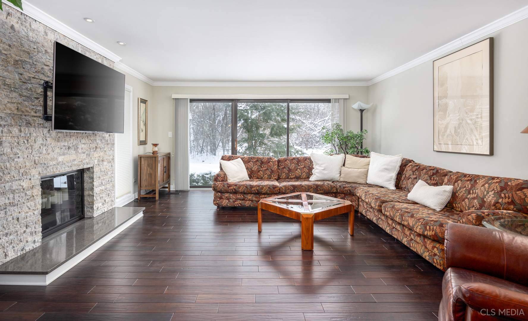 739 Old Barn Road Lake Barrington, IL 60010 - Photo 2 of 37 a living room with furniture a flat screen tv and a fireplace