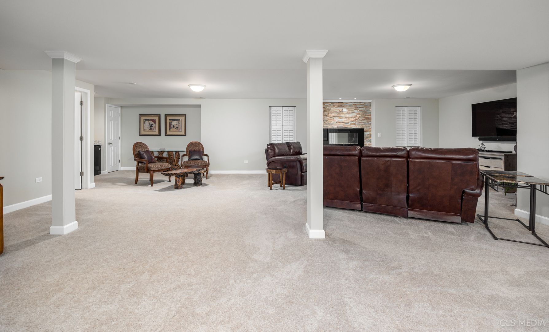 739 Old Barn Road Lake Barrington, IL 60010 - Photo 23 of 37 a living room with furniture and a flat screen tv