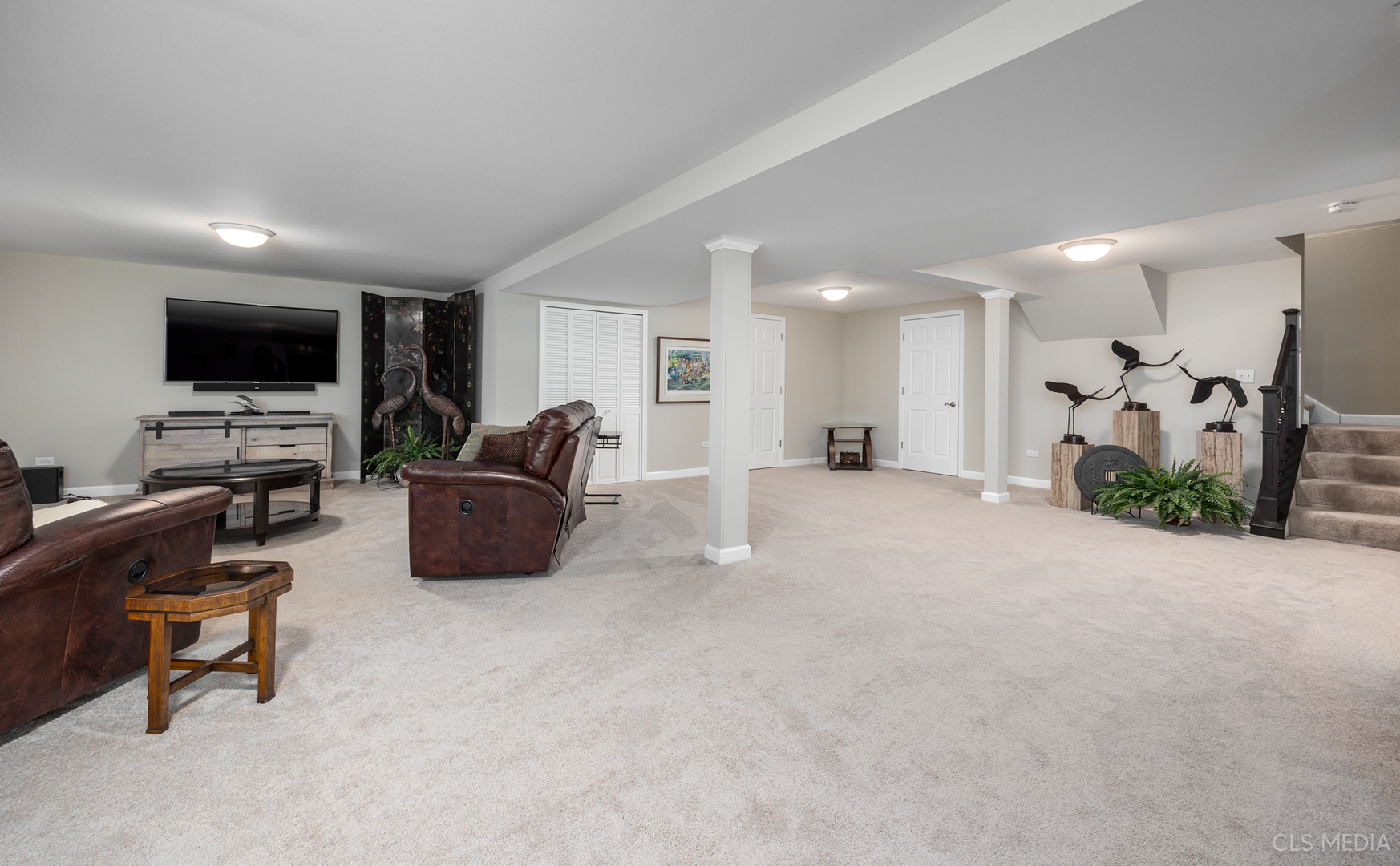 739 Old Barn Road Lake Barrington, IL 60010 - Photo 25 of 37 a living room with furniture and a flat screen tv