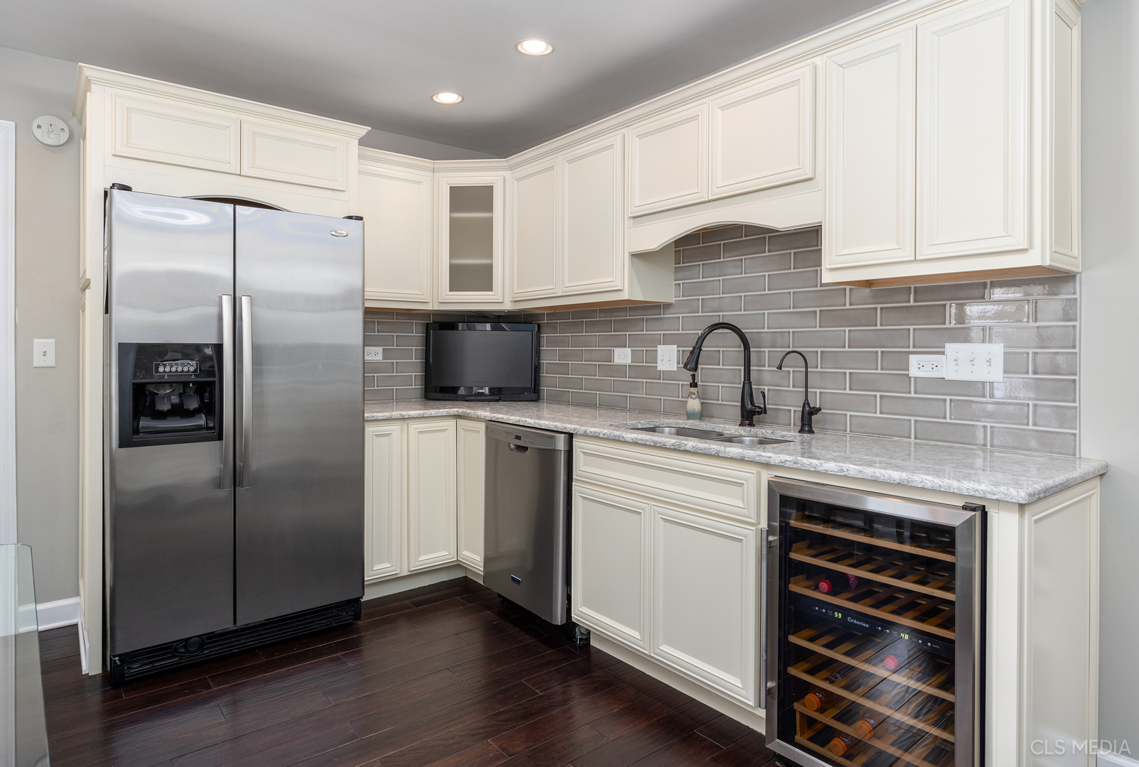 739 Old Barn Road Lake Barrington, IL 60010 - Photo 8 of 37 a kitchen with stainless steel appliances a refrigerator sink and cabinets