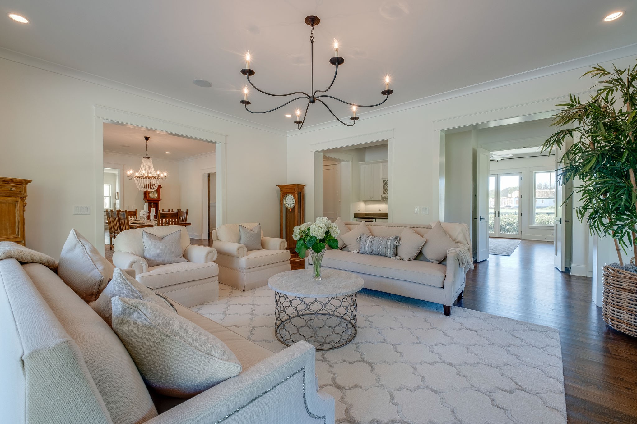 4224 Two Rivers Lane Franklin, TN 37069 - Photo 12 of 50 a living room with furniture and a chandelier