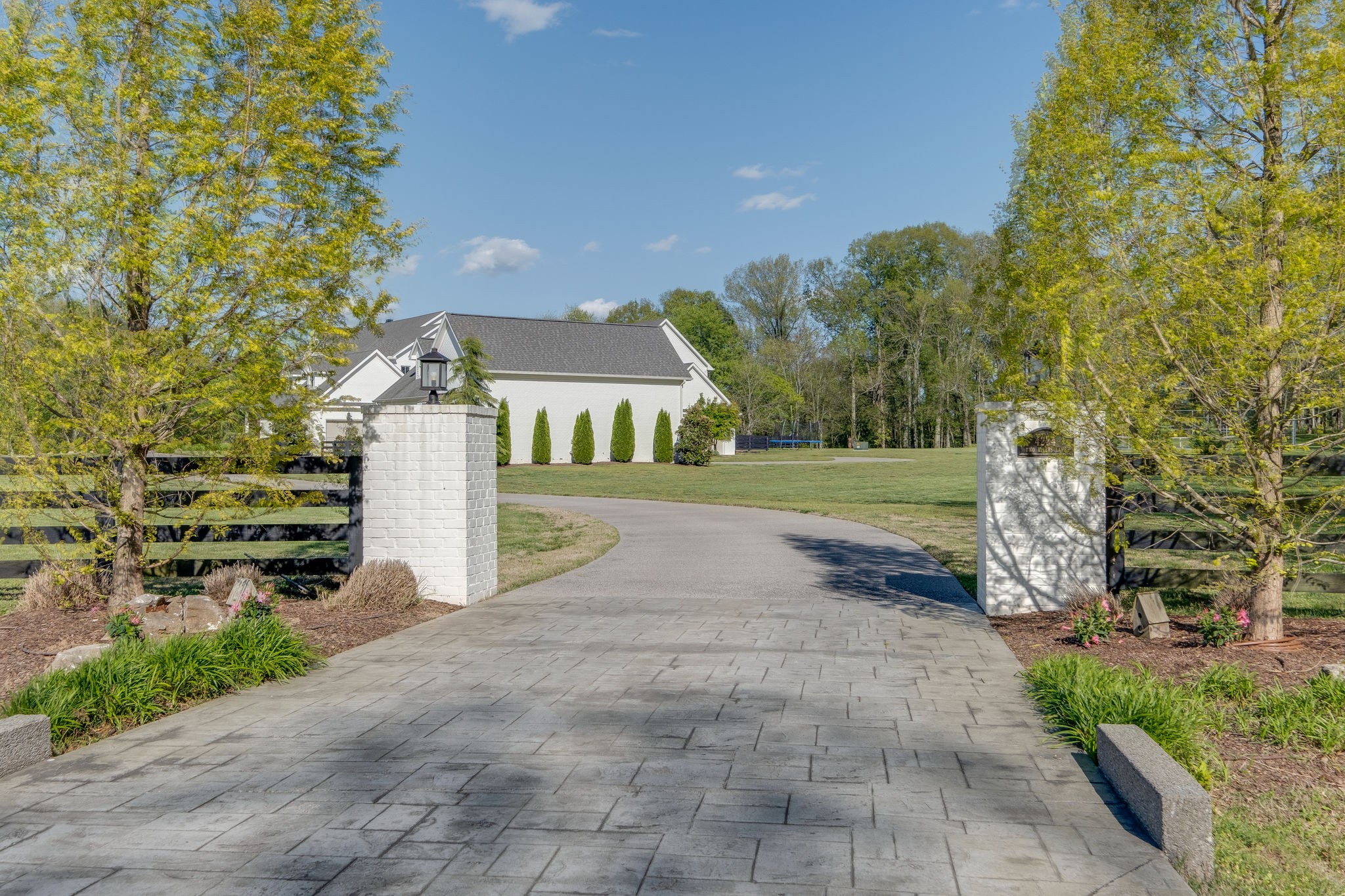 4224 Two Rivers Lane Franklin, TN 37069 - Photo 2 of 50 a view of a house with a yard and tree s