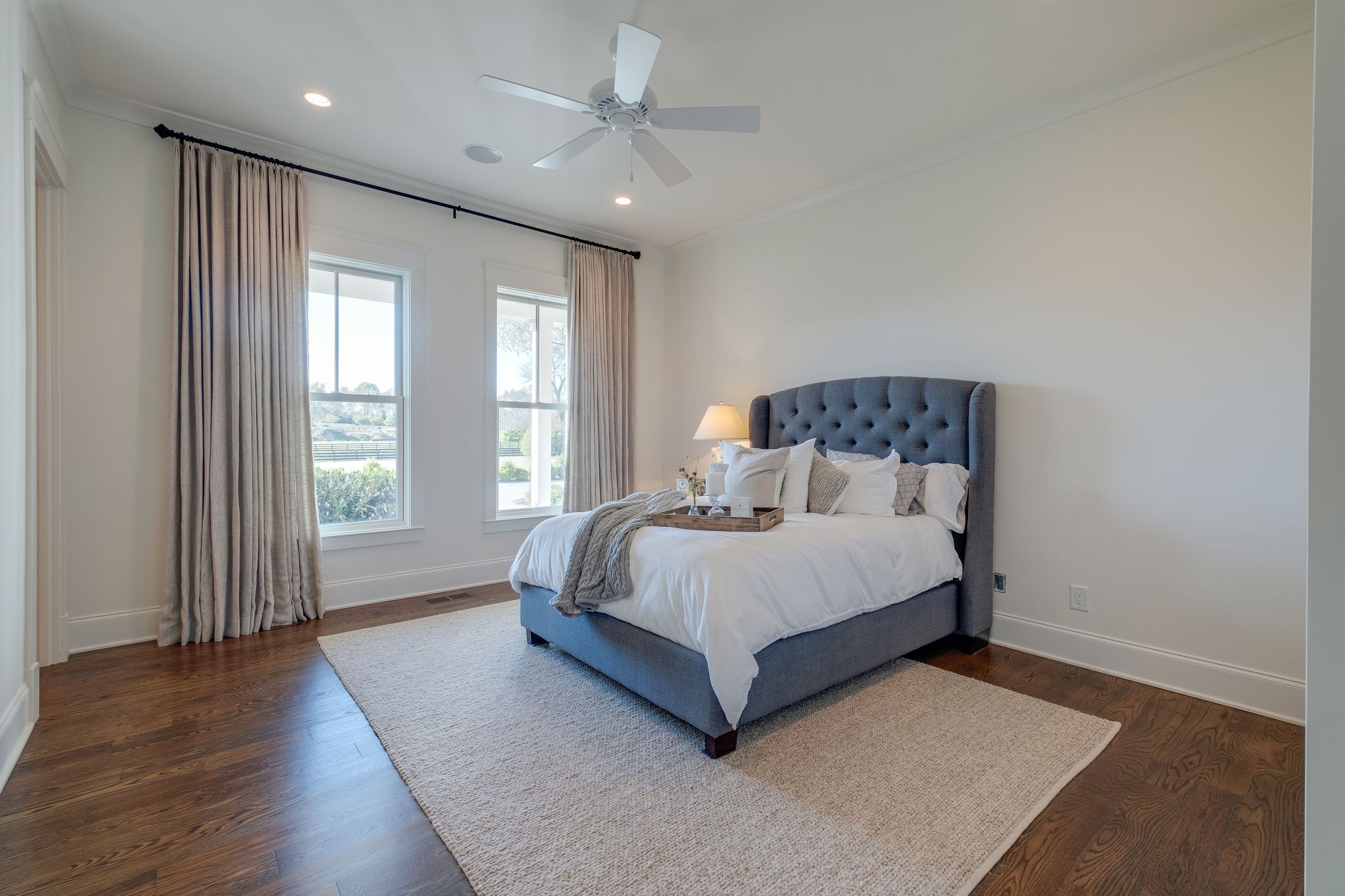 4224 Two Rivers Lane Franklin, TN 37069 - Photo 25 of 50 a bed sitting in a spacious bedroom next to a window