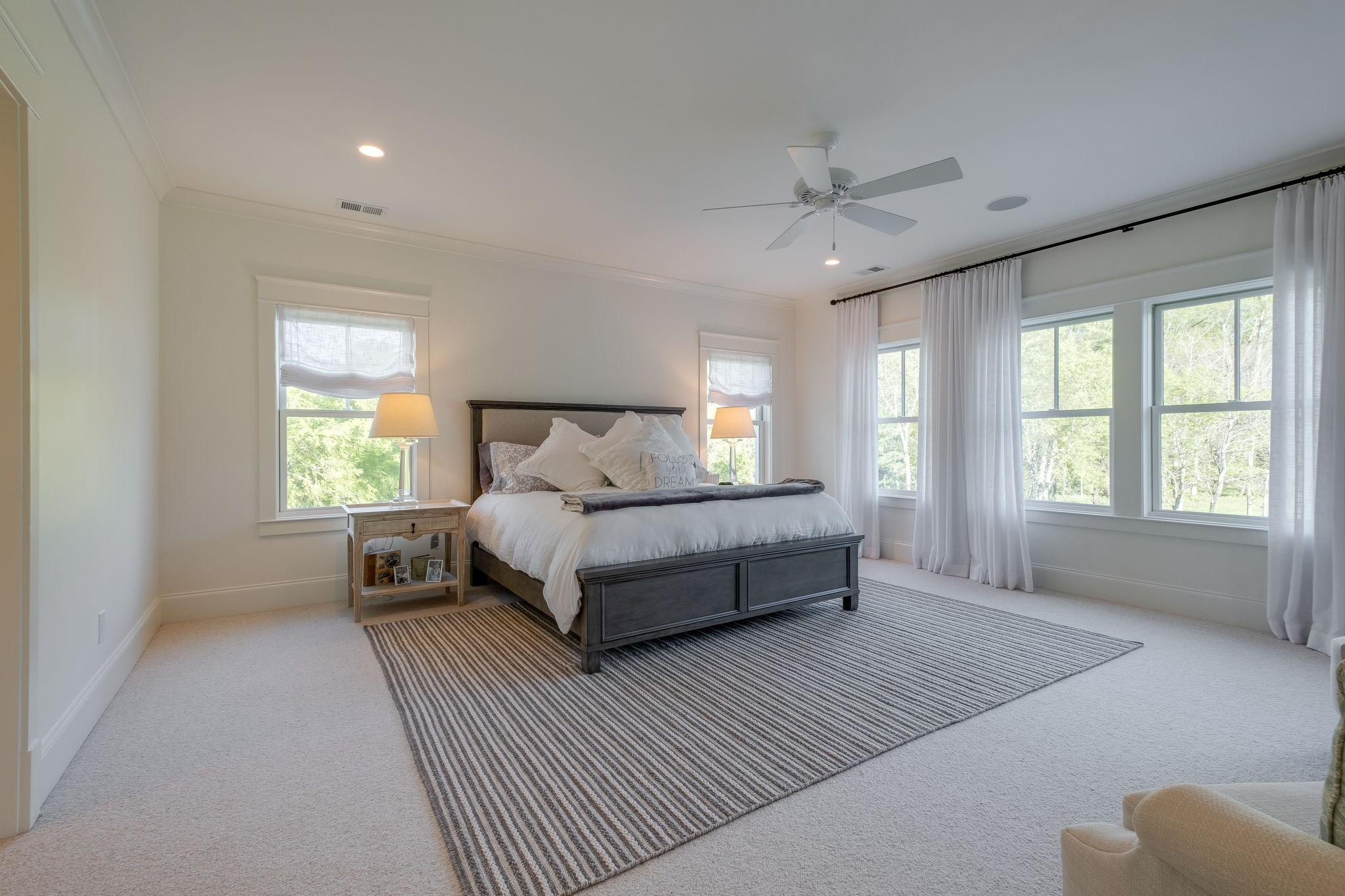 4224 Two Rivers Lane Franklin, TN 37069 - Photo 28 of 50 a bedroom with a bed wooden floor and window