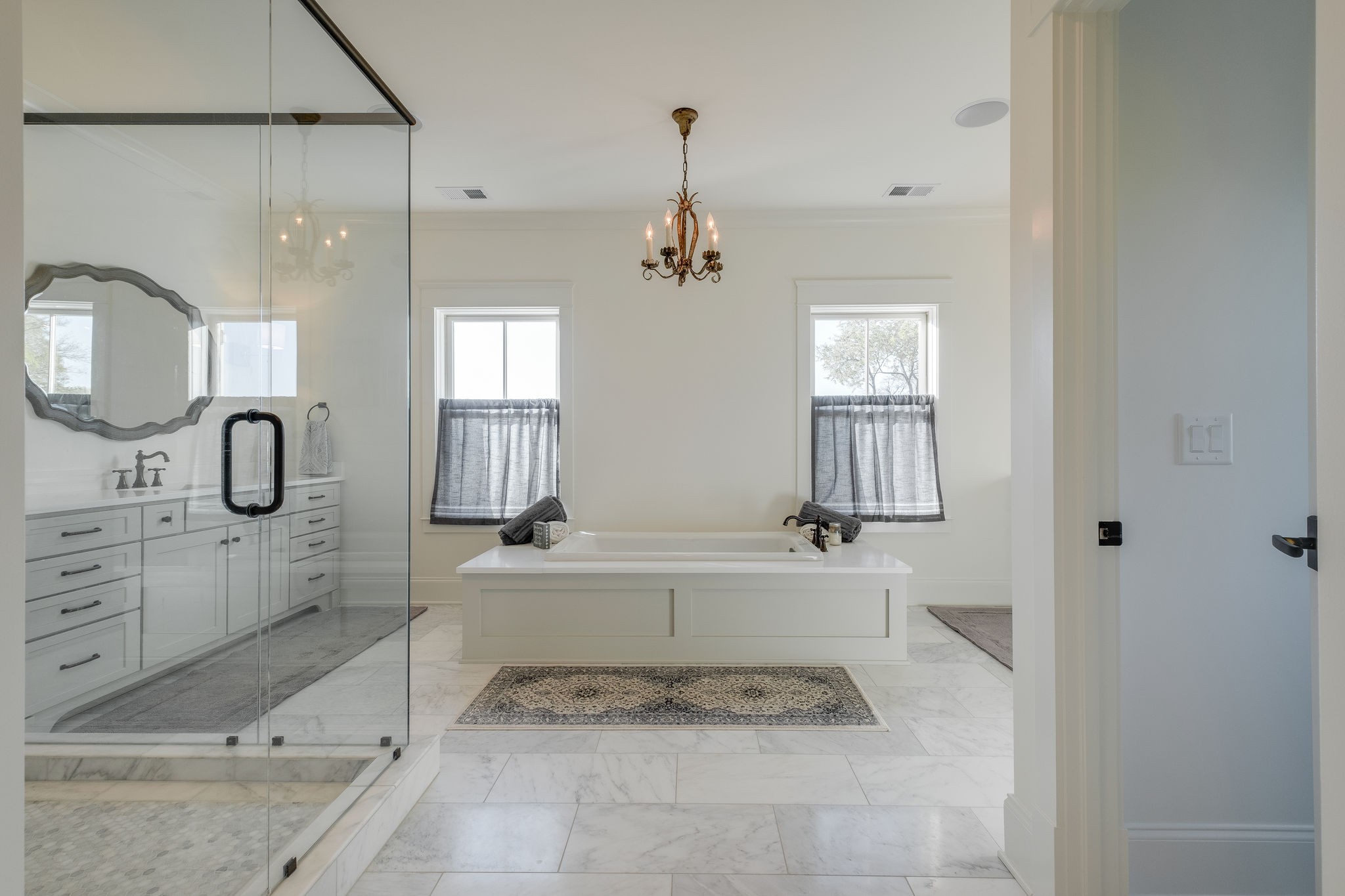 4224 Two Rivers Lane Franklin, TN 37069 - Photo 31 of 50 a spacious bathroom with a tub sink and mirror