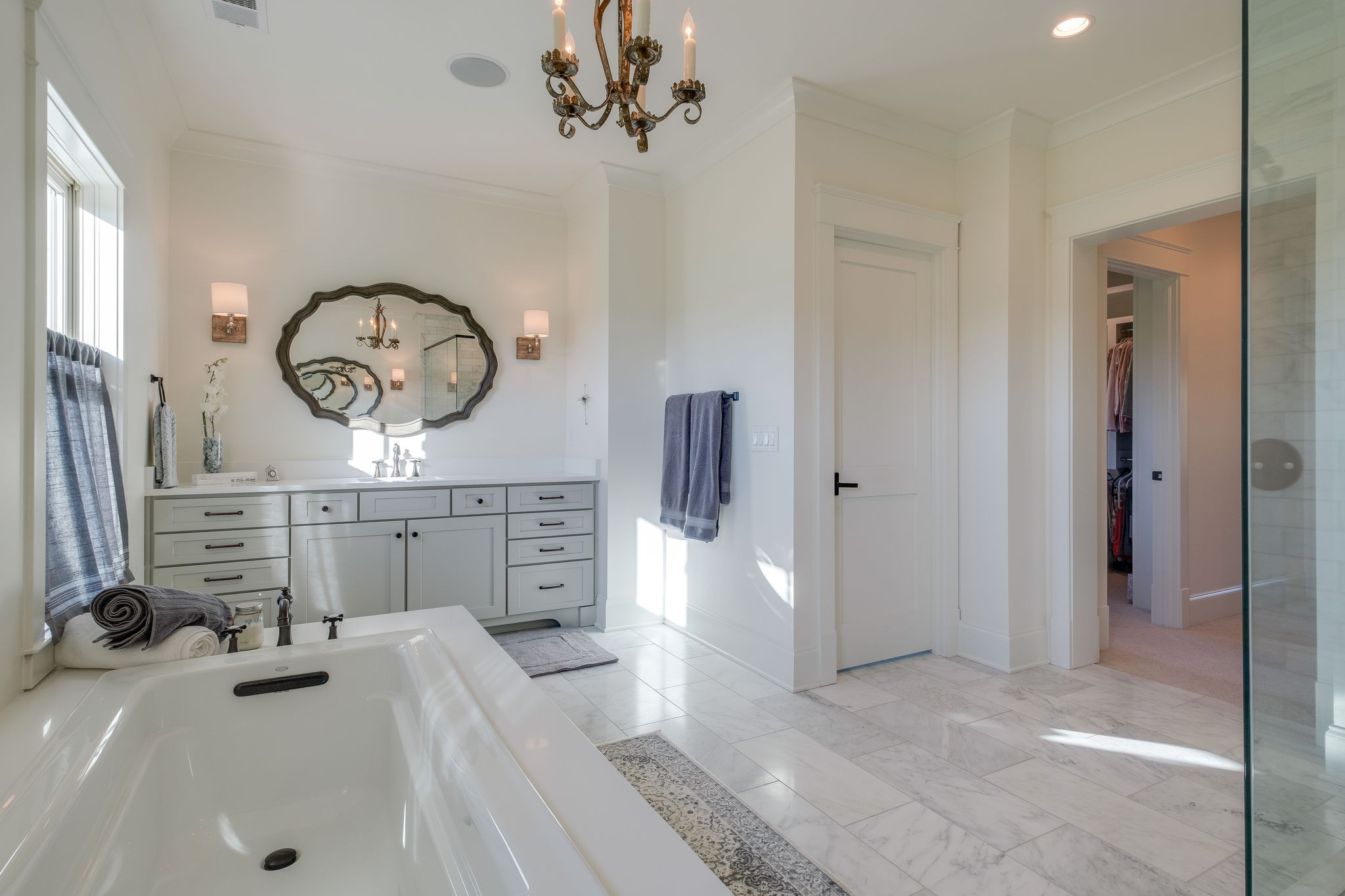 4224 Two Rivers Lane Franklin, TN 37069 - Photo 32 of 50 a bathroom with a sink a vanity and a large mirror