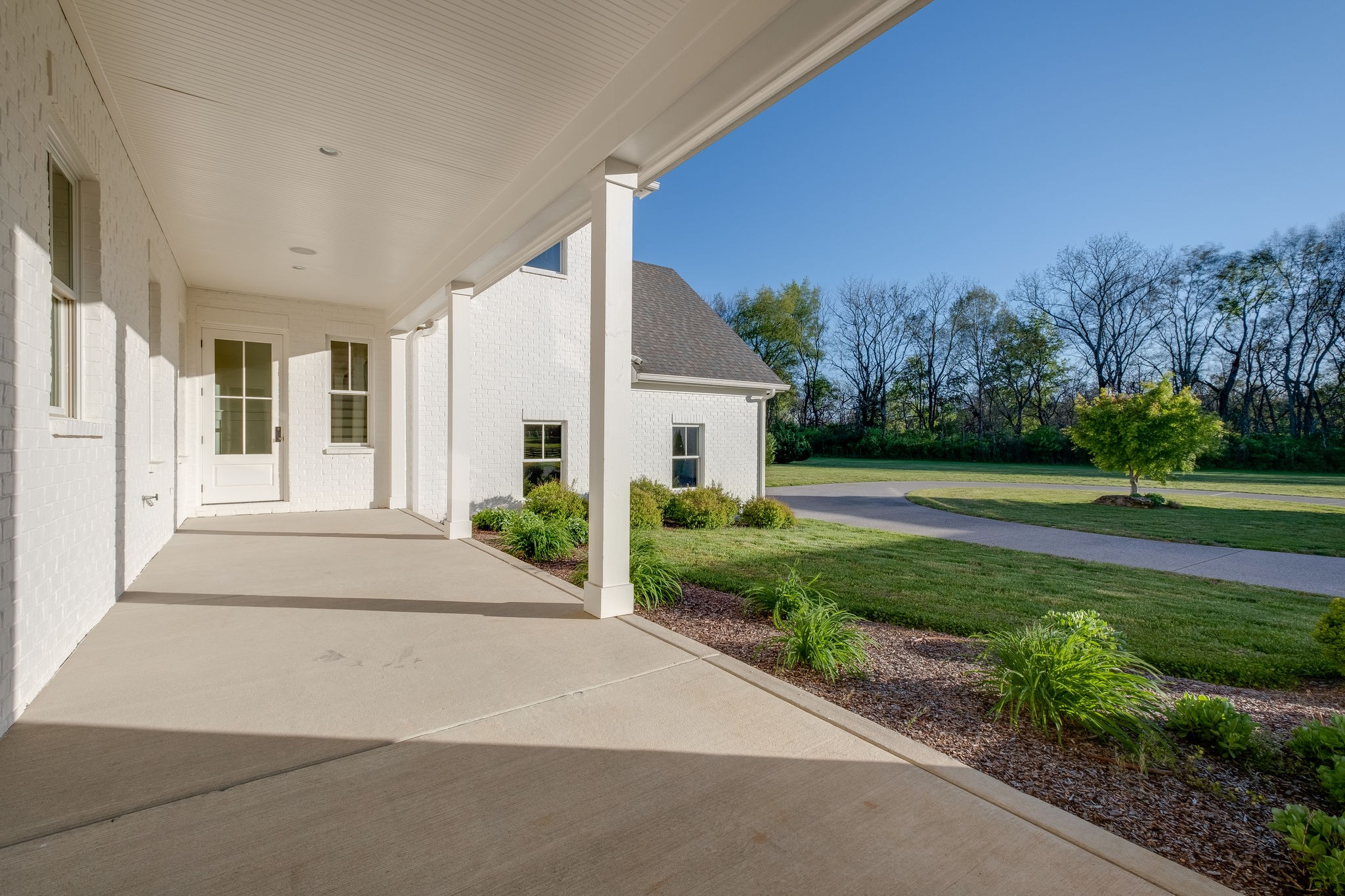 4224 Two Rivers Lane Franklin, TN 37069 - Photo 42 of 50 a front view of a house with garden