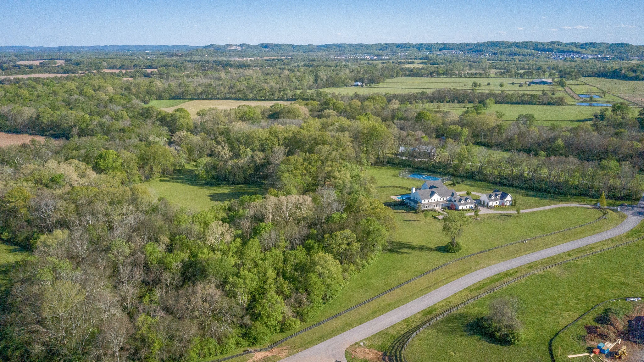 4224 Two Rivers Lane Franklin, TN 37069 - Photo 50 of 50 a view of a city with lush green forest