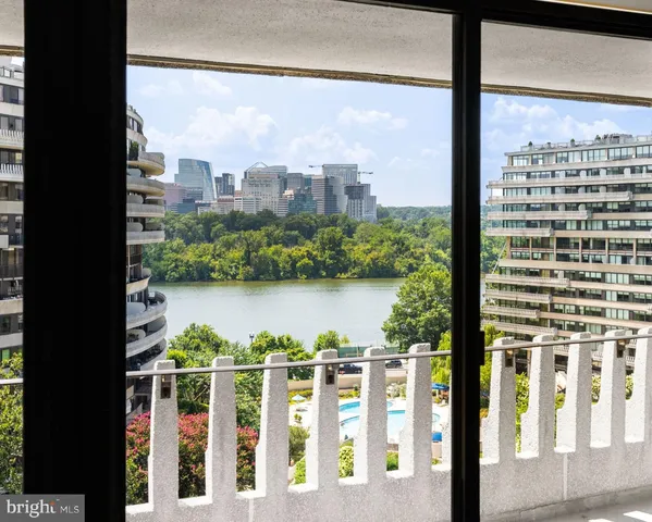 a view of a balcony with lake view