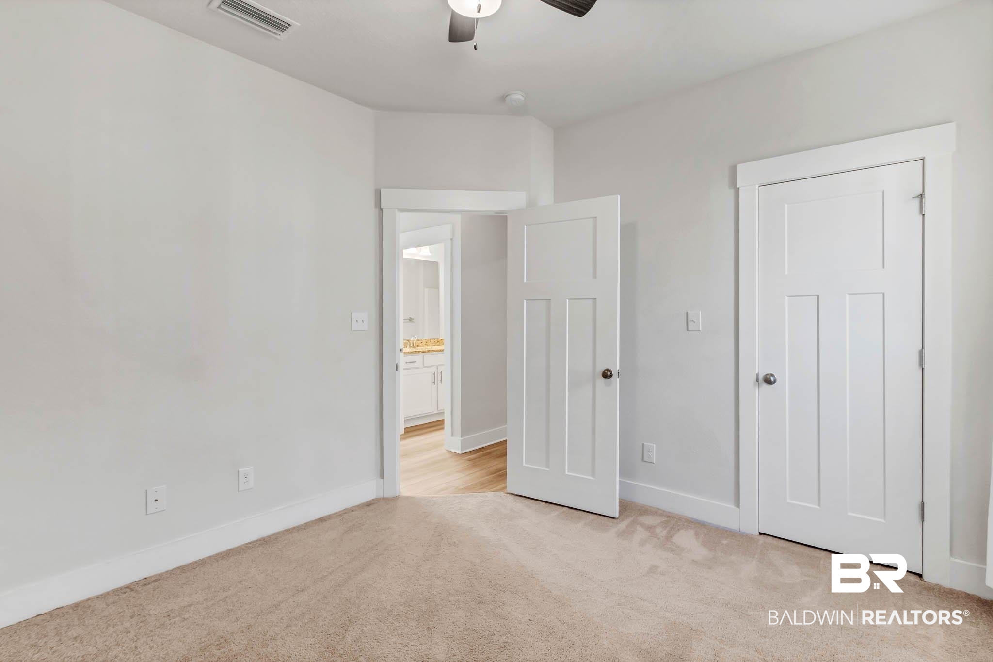 16461 Prado Loop Loxley, AL 36551 - Photo 36 of 78 Unfurnished bedroom with light carpet and ceiling fan