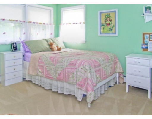 4 Wedgewood Road Natick, MA 01760 - Photo 5 of 6 a bedroom with a bed and a dresser