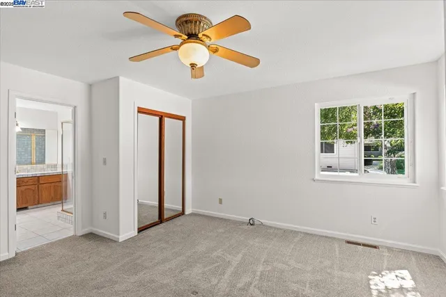a bathroom with a sink a vanity and a mirror
