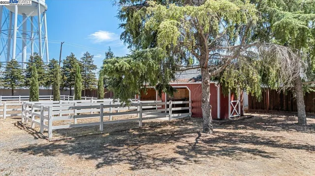 a view of outdoor space with deck and yard