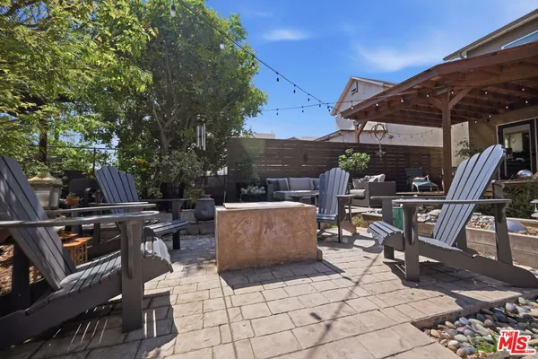 a view of outdoor dining space with a patio