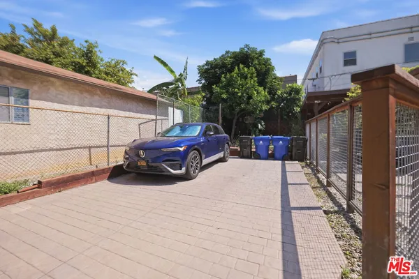 a car parked in front of a house