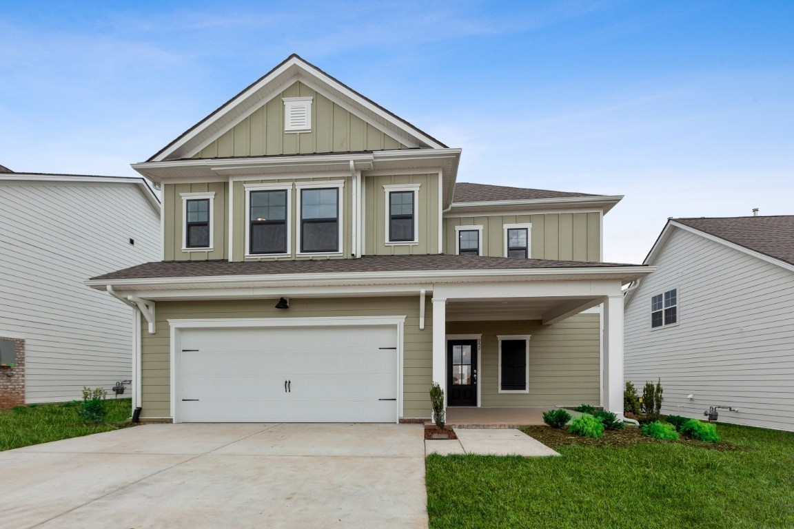 623 Castle Road Mount Juliet, TN 37122 - Photo 2 of 13 a front view of a house with a yard and garage