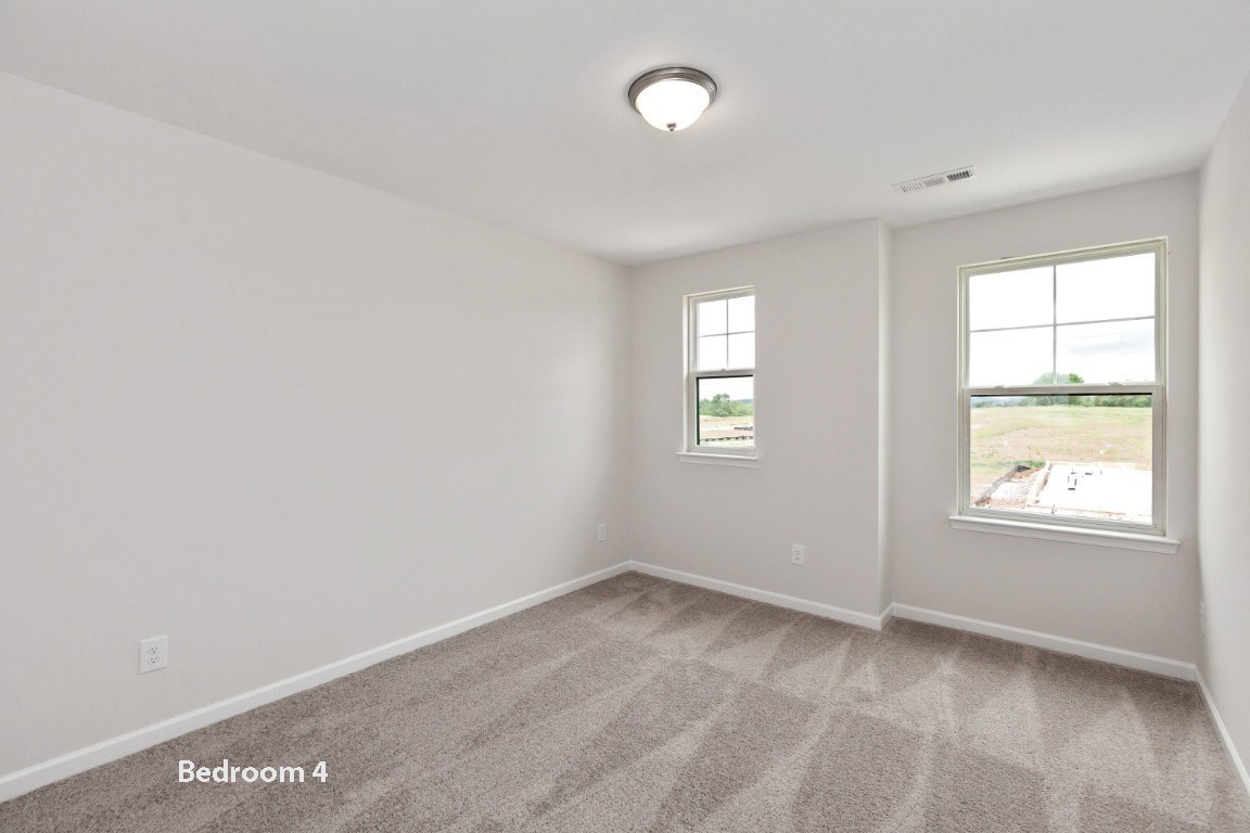 623 Castle Road Mount Juliet, TN 37122 - Photo 9 of 13 an empty room with windows