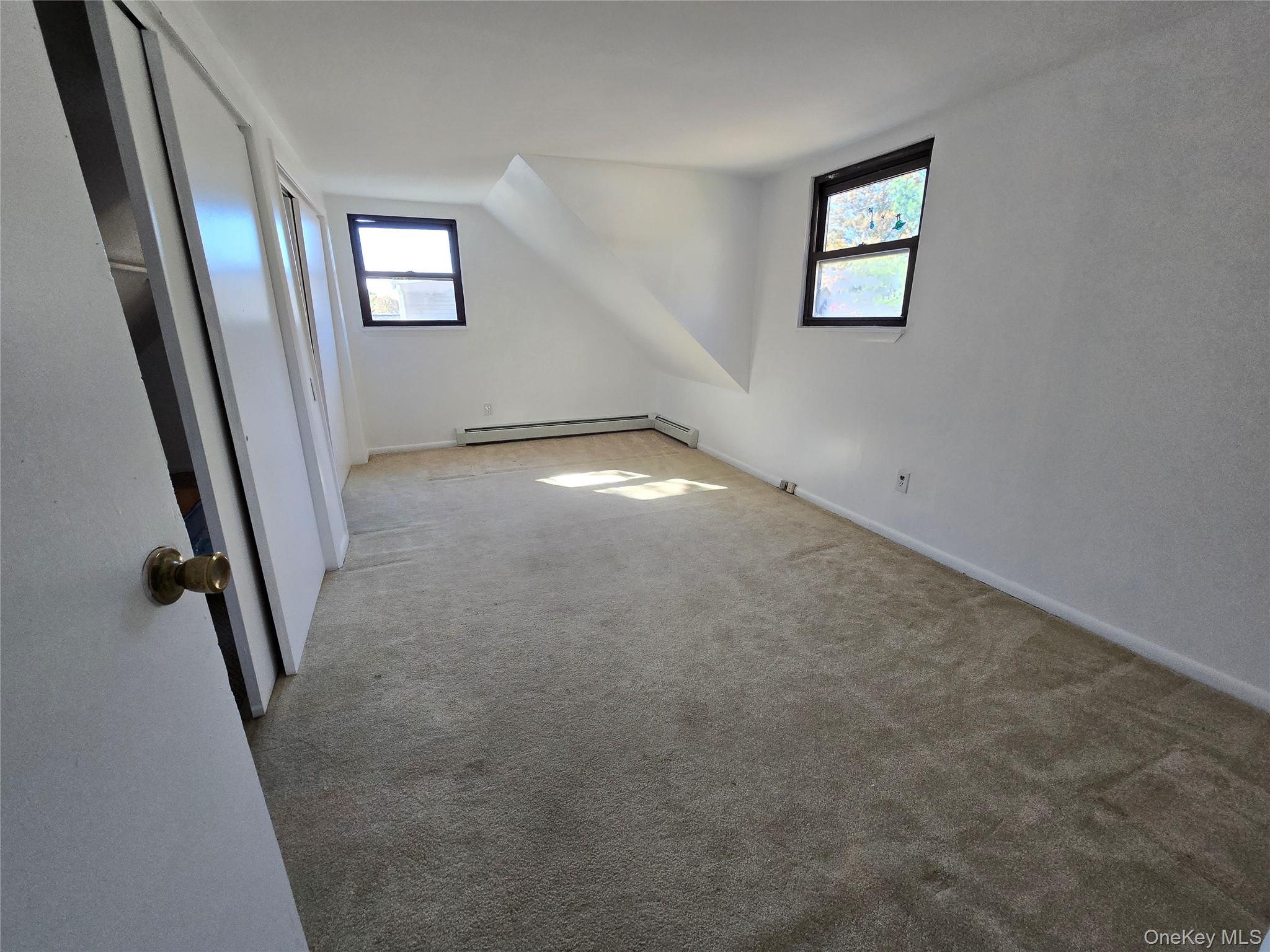24 Oakbrook Road Ossining, NY 10562 - Photo 14 of 17 an empty room with windows