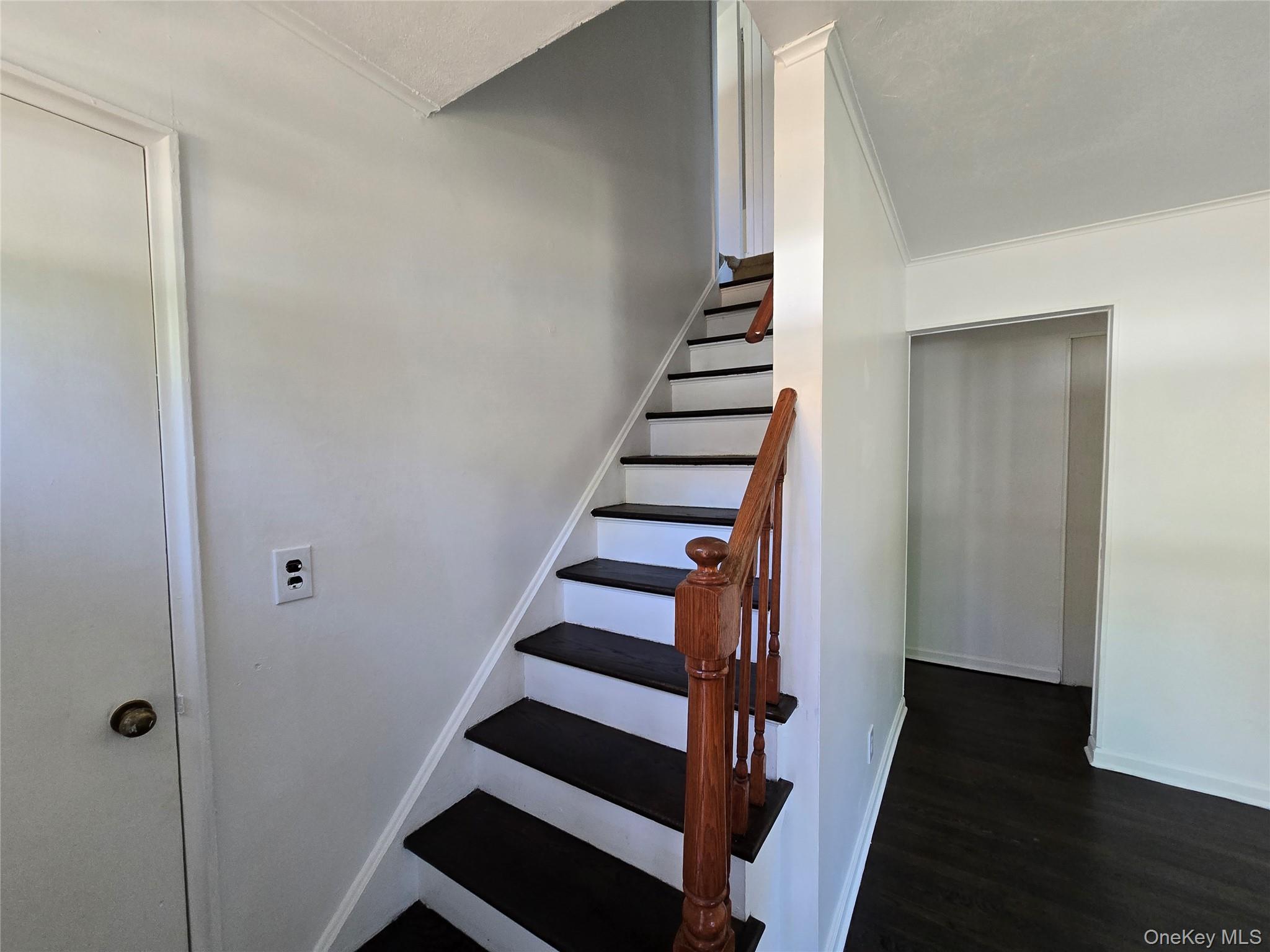 24 Oakbrook Road Ossining, NY 10562 - Photo 5 of 17 a view of entryway with wooden floor and stairs