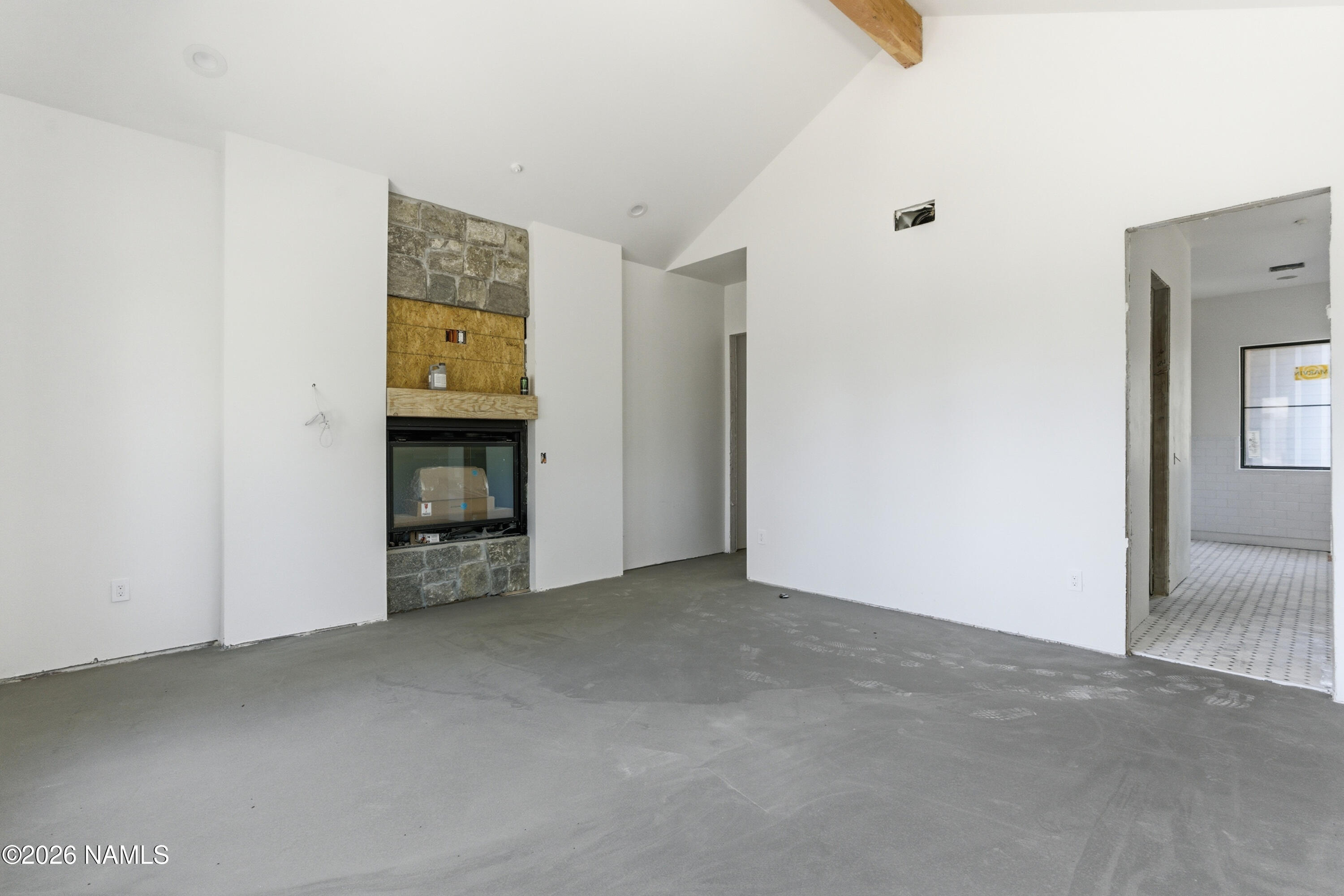 2380 East Del Rae Drive Flagstaff, AZ 86005 - Photo 9 of 26 a view of an empty room with closet and a window