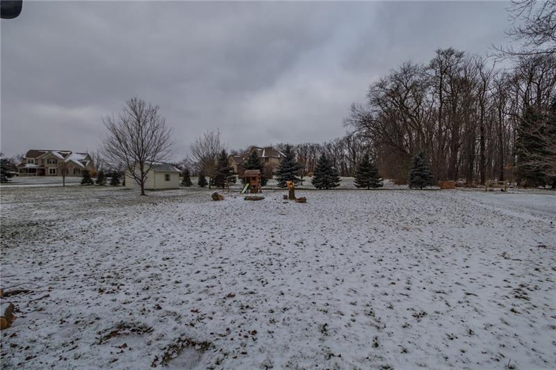 5550 Dutch Ridge Road Beaver, PA 15009 - Photo 2 of 15 The professionally landscaped lot w/firepit offers room for pets & families to roam.