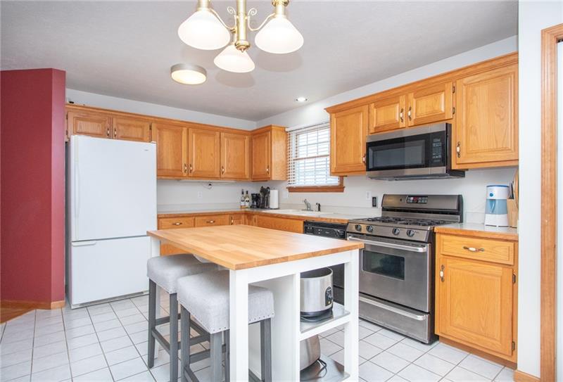 5550 Dutch Ridge Road Beaver, PA 15009 - Photo 5 of 15 The spacious kitchen includes an island w/seating, good cabinet & counter space plus a large pantry.