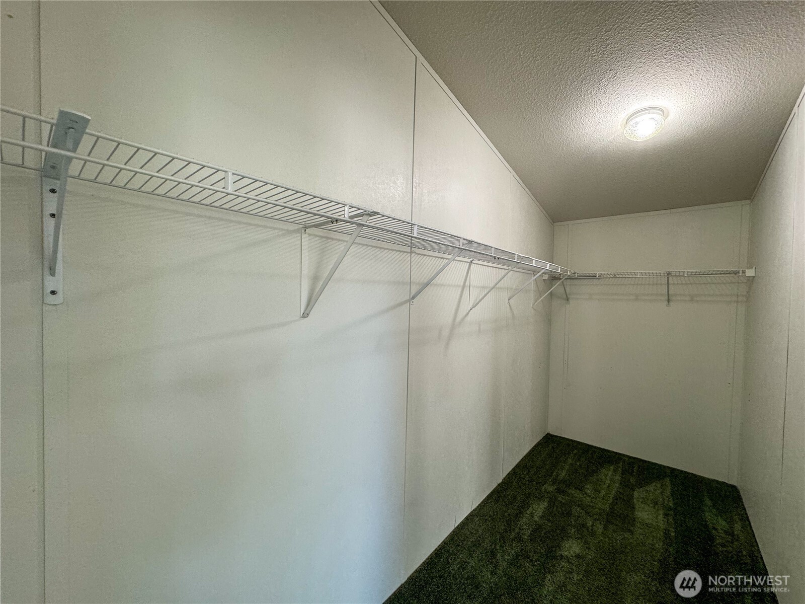 773 Lucas Creek Road Chehalis, WA 98532 - Photo 13 of 37 a view of a room with racks on the wall