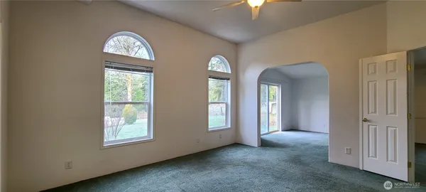 a kitchen with stainless steel appliances granite countertop a stove a refrigerator and a sink