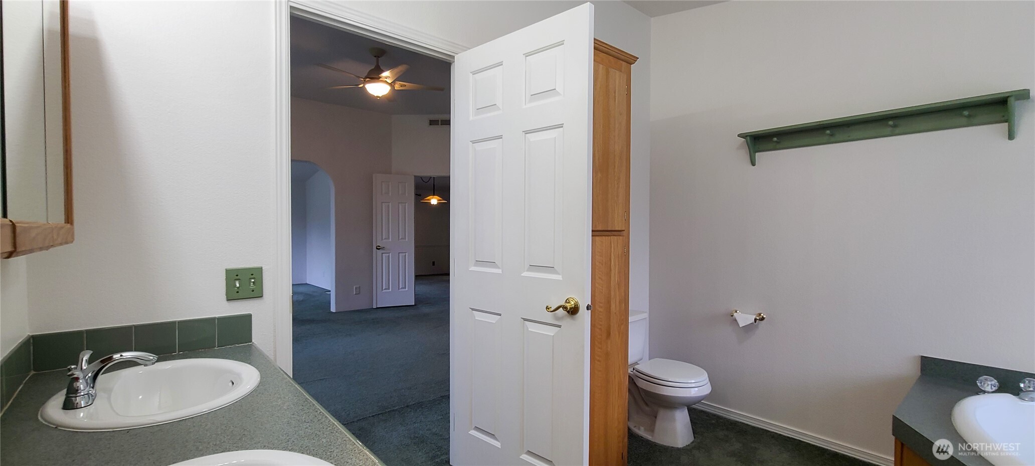 773 Lucas Creek Road Chehalis, WA 98532 - Photo 16 of 40 a bathroom with a granite countertop sink toilet and shower