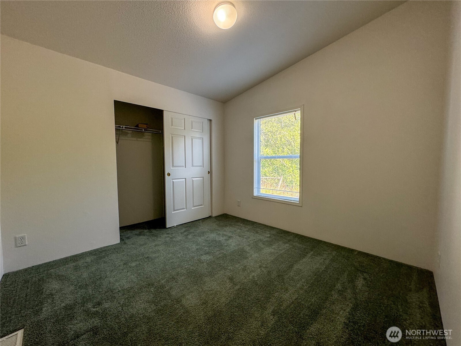 773 Lucas Creek Road Chehalis, WA 98532 - Photo 19 of 37 an empty room with windows and closet