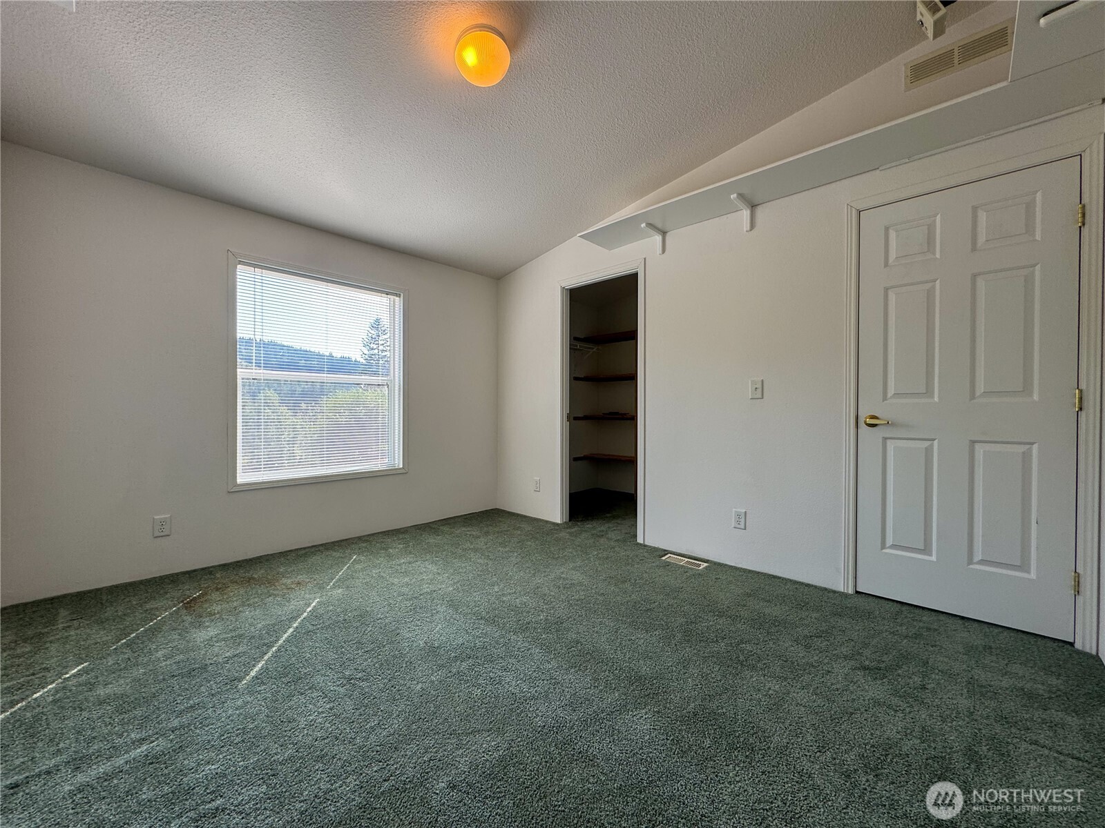 773 Lucas Creek Road Chehalis, WA 98532 - Photo 20 of 40 an empty room with windows