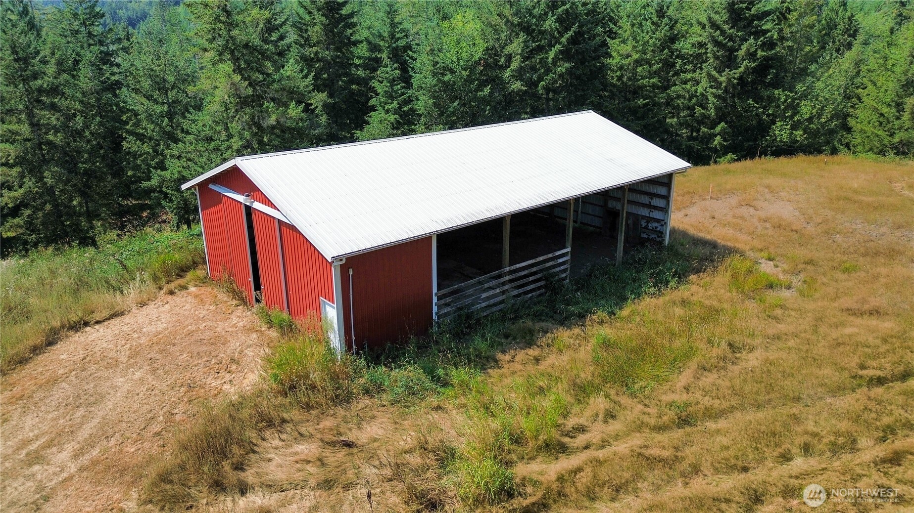 773 Lucas Creek Road Chehalis, WA 98532 - Photo 26 of 40 a view of a house with a yard and large tree