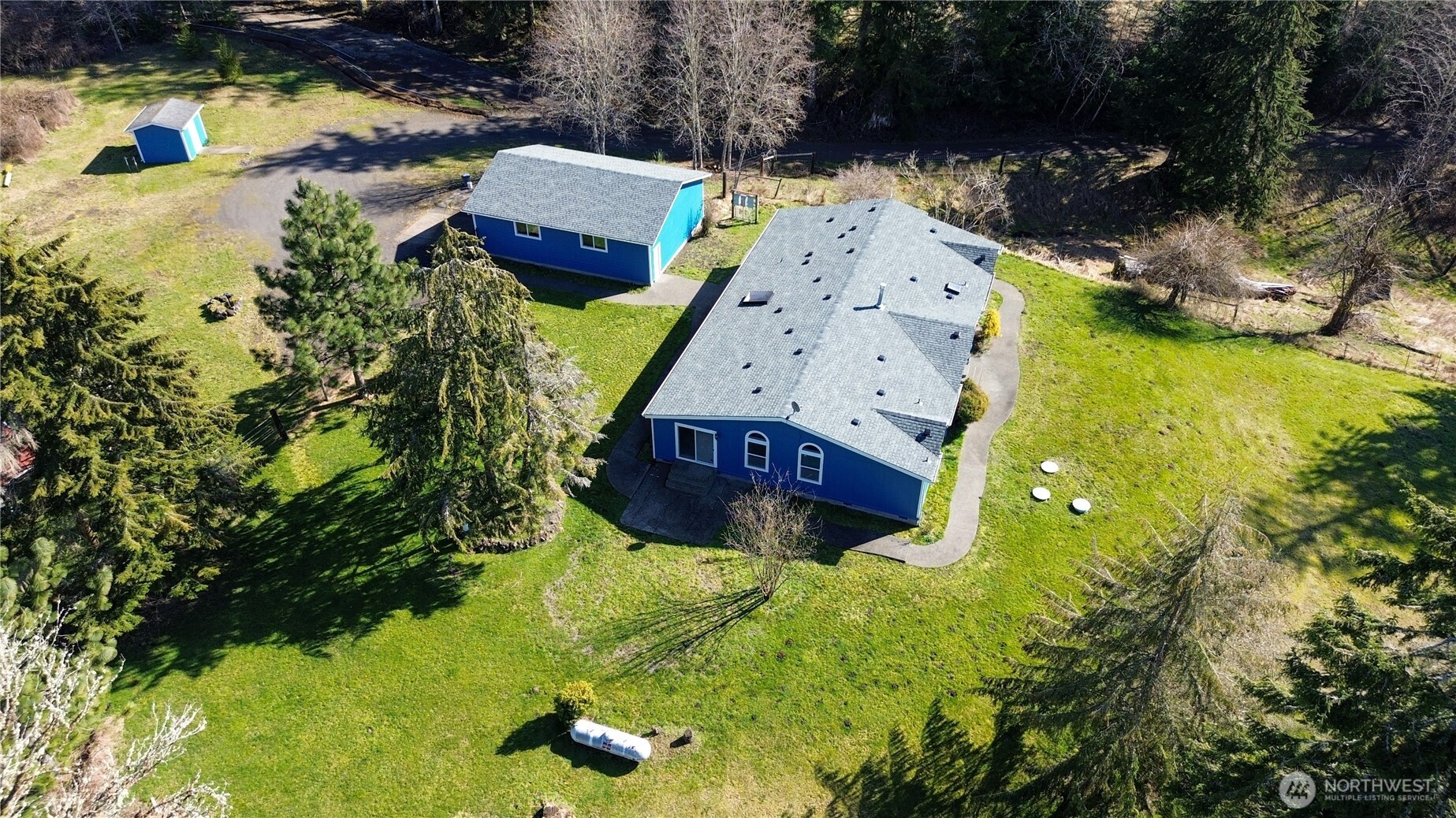 773 Lucas Creek Road Chehalis, WA 98532 - Photo 35 of 40 an aerial view of a house with yard swimming pool and outdoor seating