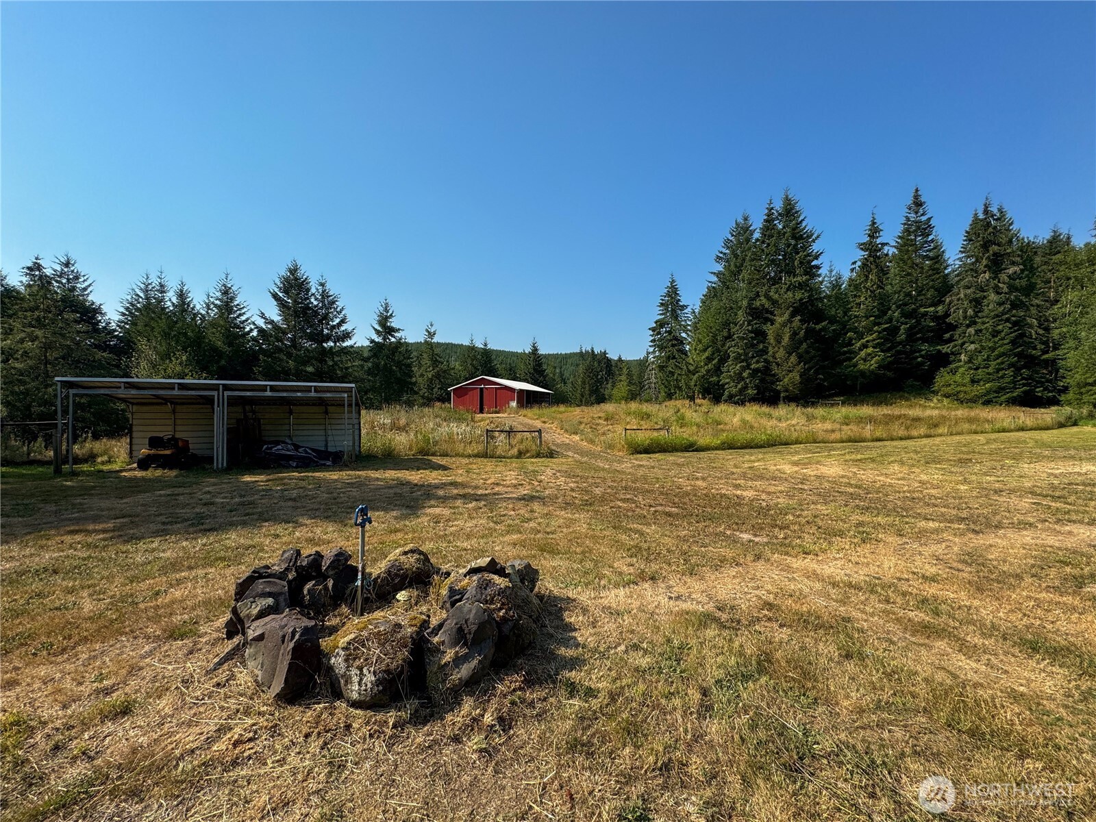 773 Lucas Creek Road Chehalis, WA 98532 - Photo 38 of 40 a backyard of a house with lots of green space