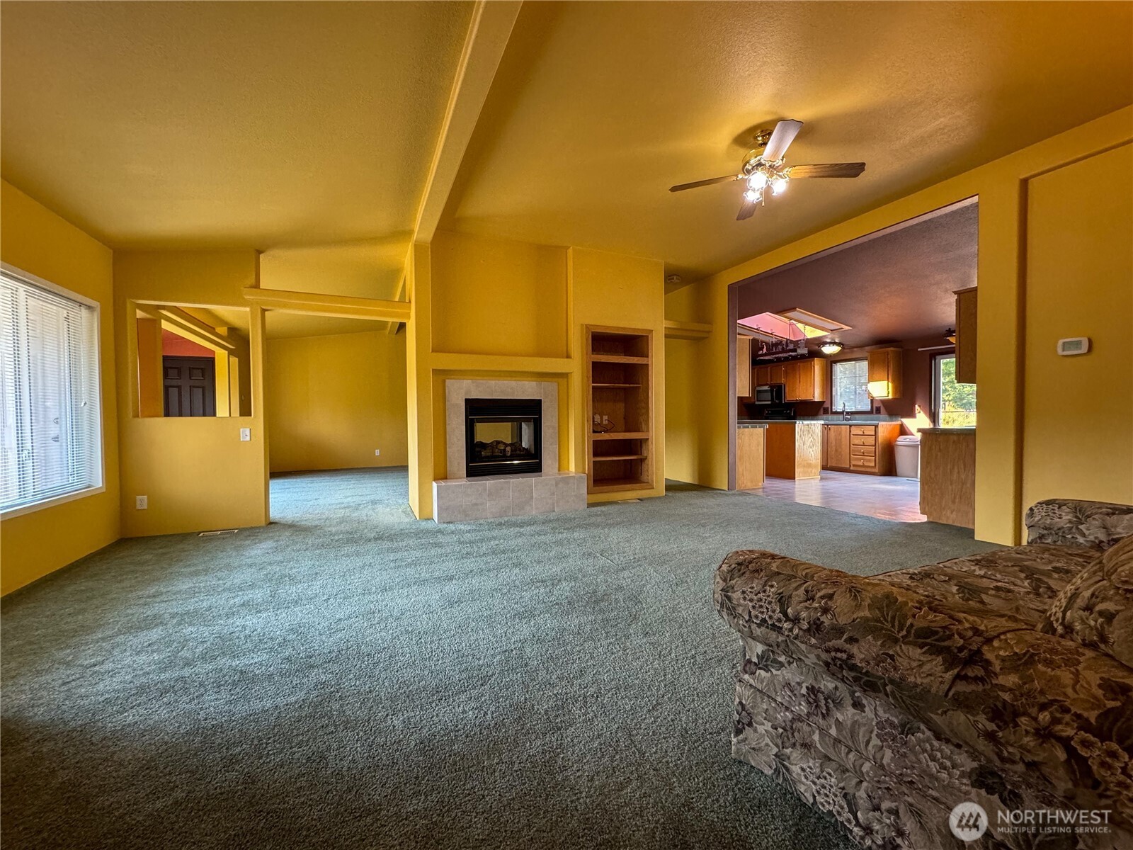 773 Lucas Creek Road Chehalis, WA 98532 - Photo 4 of 37 a living room with furniture and a fireplace