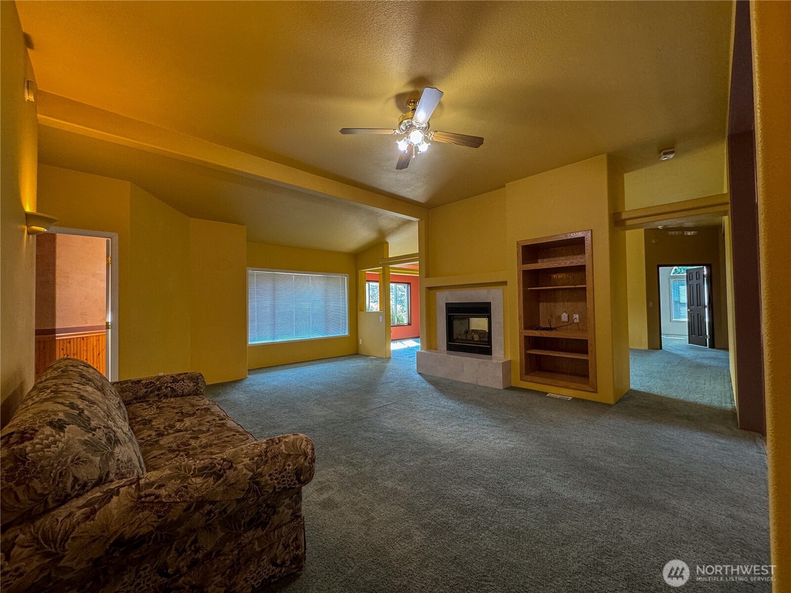 773 Lucas Creek Road Chehalis, WA 98532 - Photo 5 of 37 a spacious bedroom with a bed and ceiling fan