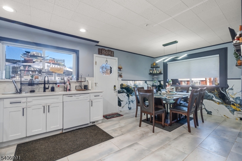 460 Grove Street Rahway, NJ 07065 - Photo 12 of 26 a view of a dining table and chairs in a room