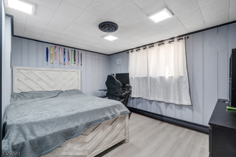 460 Grove Street Rahway, NJ 07065 - Photo 15 of 26 a bedroom with a bed and window