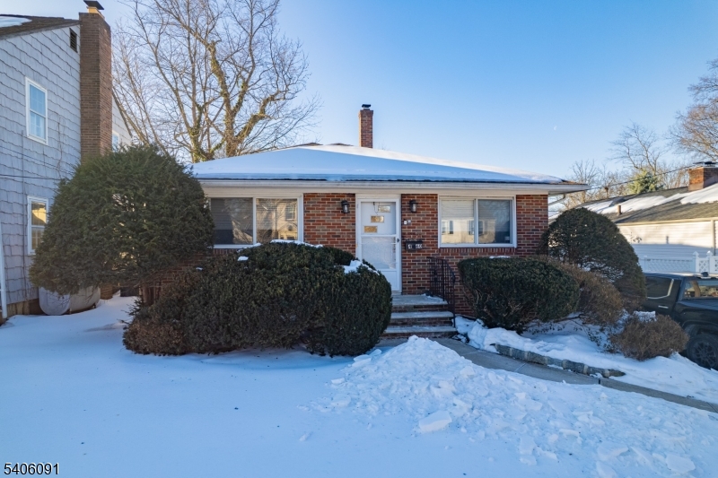 460 Grove Street Rahway, NJ 07065 - Photo 3 of 26 a view of a house with a yard