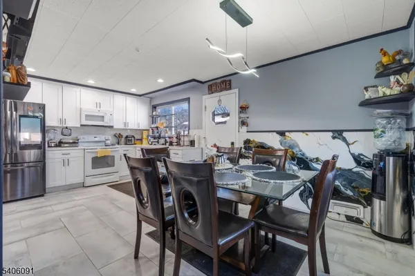 a view of a dining room kitchen and a window