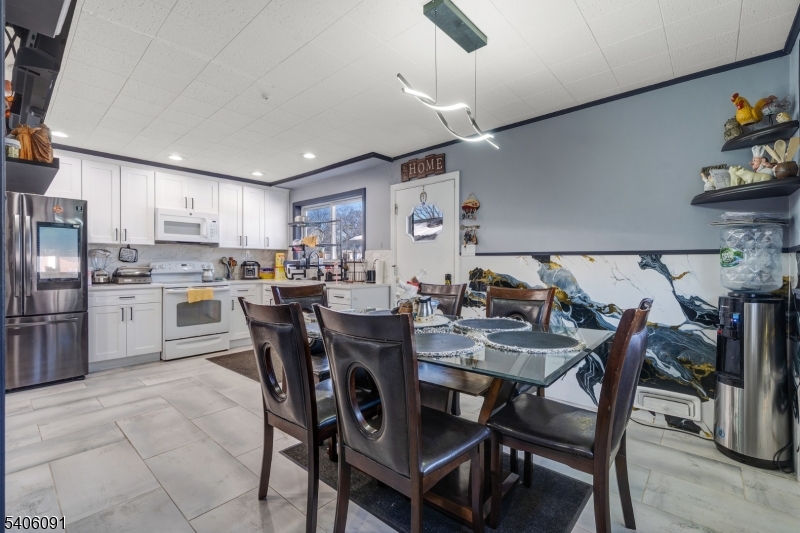 460 Grove Street Rahway, NJ 07065 - Photo 10 of 26 a view of a dining room kitchen and a window