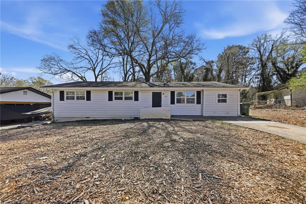 2086 Fairburn Road Southwest Atlanta, GA 30331 - Photo 1 of 28 front view of a house with a yard