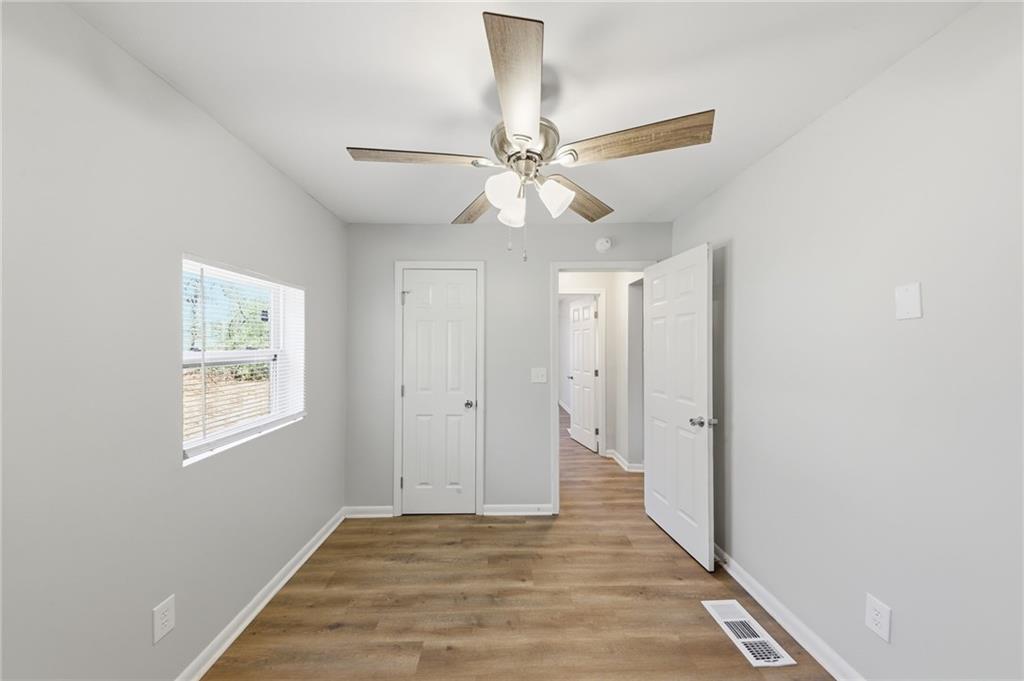 2086 Fairburn Road Southwest Atlanta, GA 30331 - Photo 12 of 28 a view of an empty room with a window