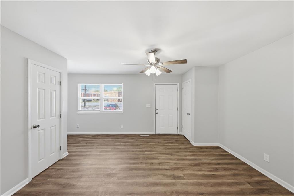2086 Fairburn Road Southwest Atlanta, GA 30331 - Photo 4 of 28 wooden floor in an empty room