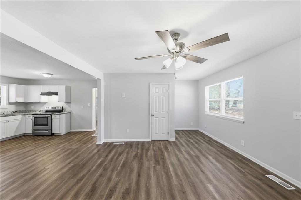 2086 Fairburn Road Southwest Atlanta, GA 30331 - Photo 5 of 28 a view of kitchen with sink microwave and cabinets