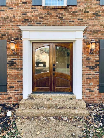 a view of entrance front of house