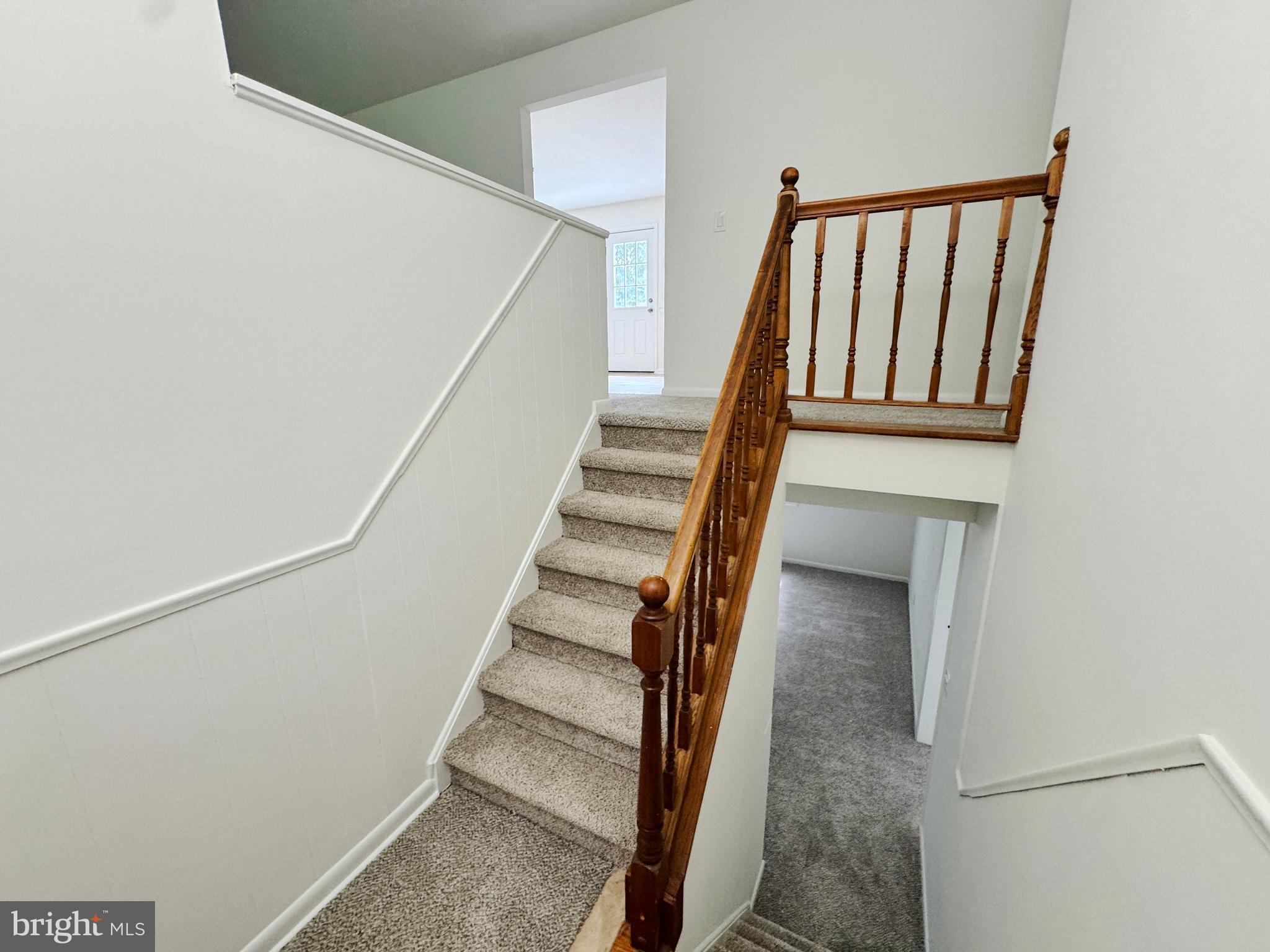 154 Niantic Road Barto, PA 19504 - Photo 2 of 33 a view of staircase with wooden floor and white walls